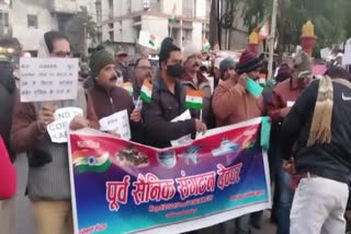 Ex servicemen candle march for bank guard beating in Deoghar