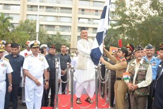 MH Celebrating Veterans Day in Mumbai Governor displays flag at parade
