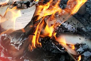 narmadapuram wrapped cloth and set fire to bible