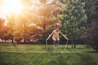 Girl playing skipping