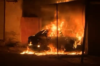 Indore car standing outside house set fire