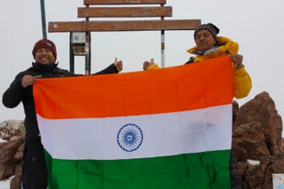 Sporting old shoes Satyrup Siddhant unfurls Indian flag at Mount Kenya