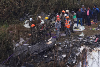 Nepal began a national day of mourning Monday as rescue workers resumed the search for six missing people a day after a plane to a tourist town crashed into a gorge while attempting to land at a newly opened airport