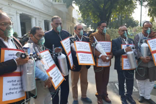 BJP MLAs in Delhi Assembly with oxygen cylinder