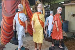 Narendra Modi idols wearing different clothes