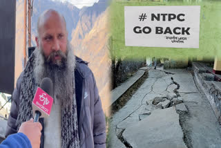 Joshimath residents Put up NTPC go back poster