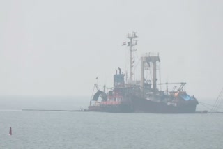 Oil removal from the sunken Chinese vessel