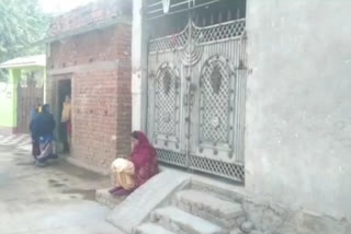 Girlfriend sitting at door of lover house