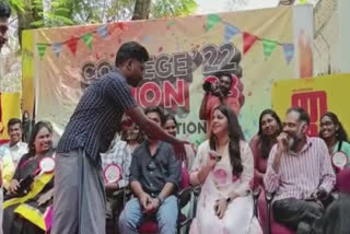 Law student trying to shake hand with actor Aparna Balamurali