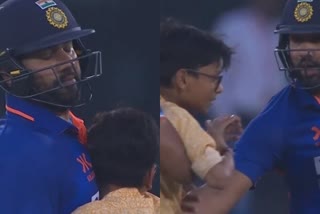 ind-vs-nz-a-fan-invaded-the-field-and-hugged-rohit-sharma-during-india-vs-new-zealand-2nd-odi