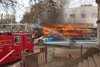bus standing for repair caught fire in jhabua