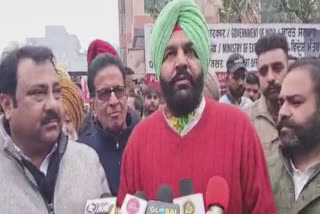 Gurjeet aujla staged a protest outside the regional passport office  Amritsar