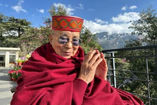 dalai lama wearing himachali top