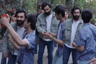 Annoyed Ranbir Kapoor throws fan s phone  Ranbir Kapoor throws fan s phone  സെല്‍ഫി എടുത്ത് ആരാധകരന്‍  ദേഷ്യപ്പെട്ട് രണ്‍ബീര്‍  രണ്‍ബീര്‍ ആരാധകന്‍റെ ഫോണ്‍ എടുത്തെറിഞ്ഞു  വീഡിയോ വൈറല്‍  രണ്‍ബീര്‍  ആരാധകന്‍റെ ഫോണ്‍ എടുത്തെറിഞ്ഞ്‌ രണ്‍ബീര്‍  രണ്‍ബീര്‍ കപൂര്‍  Ranbir annoyed and snatched away fan s phone  രണ്‍ബീറിനൊപ്പം ആരാധകന്‍ സെല്‍ഫി  രണ്‍ബീറിന്‍റെ വീഡിയോ  Ranbir posing pictures with fan  Ranbir fans believe that it is an upcoming ad  Ranbir Kapoor latest movies  Ranbir Kapoor upcoming movies  Ranbir Kapoor Shraddha Kapoor combo  സെല്‍ഫി എടുക്കുന്നതിനിടെ പ്രകോപിതനായി രണ്‍ബീര്‍