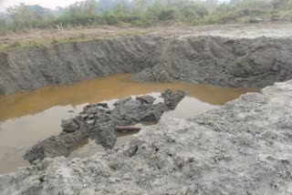 Land Mafia digging government Land in Tinsukia