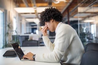 Stressed young worker