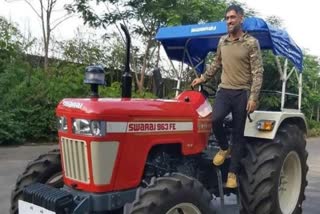 MS Dhoni driving tractor