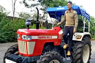 MS Dhoni driving tractor in field share video on instagram