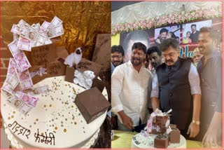 jitendra awhad cutting a cake