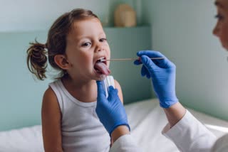 Girl During a Mouth Swab Medical Test