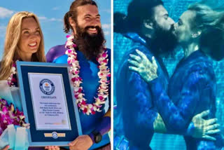 Couple's smooch sets Guinness record for longest underwater kiss