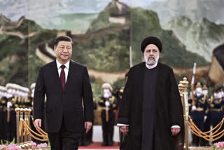 XI Jinping and  Ebrahim Raisi