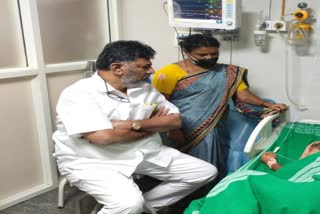 D K Shivakumar meets acid attack victim