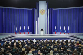 Putin addressing lawmakers