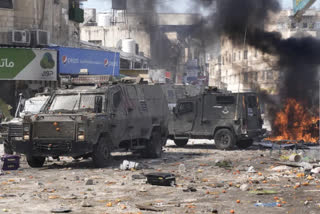 scores hurt in Israeli West Bank raid