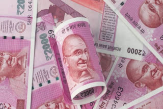 Rupee gains 11 paise against US dollar