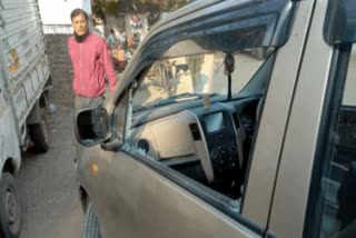 Theft by breaking glass of car