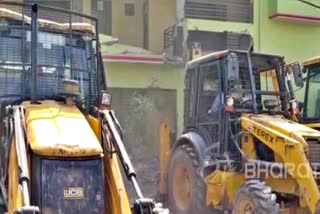 A bulldozer leveled a house