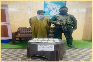 man-carrying-counterfeit-currency-notes-held-in-kulgam