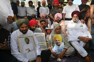 Sidhu Moose Wala parents sitting on protest outside the Punjab Vidhan Sabha