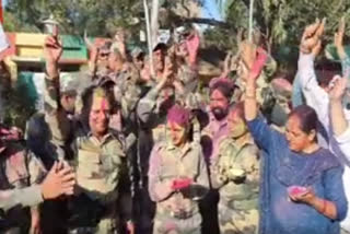 BSF personnel celebrates Holi near the International Border in Samba