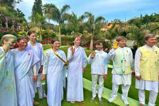 Tourists from Russia and Ukraine enjoy Holi in Mount Abu