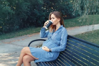 Pregnant Woman Drinking Coffee