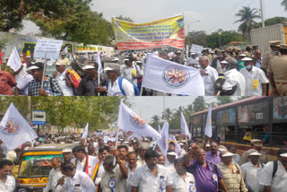 transport corporation pensioners held a rally demanding the implementation of Dearness Allowance