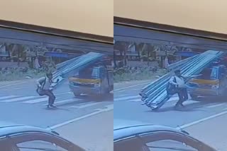 young man miraculous escape from road accident  വൻ അപകടത്തിൽ നിന്ന് യുവാവിന്‍റെ അത്ഭുത രക്ഷപ്പെടൽ  ഞെട്ടിക്കുന്ന സിസിടിവി ദൃശ്യങ്ങൾ  സിസിടിവി ദൃശ്യങ്ങൾ  CCTV Visuals  കണ്ണൂർ വാഹനാപകടം  Kannur Road Accident
