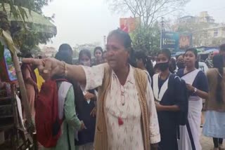 old woman challenges Assam CM