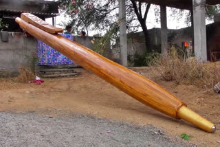 warangal man made 80kages pen with wood and won world wide book of records