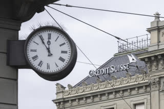 Credit Suisse shares fall, but UBS deal raises hope on banks