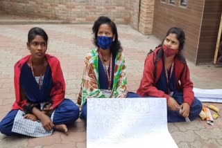 Nurshing students on hunger strike outside collector's office