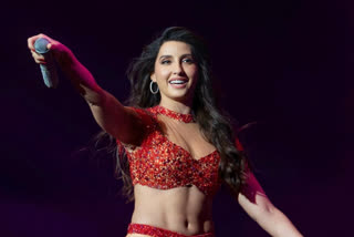 Red never goes out of fashion yet is one of the riskiest colours to opt for given its loud bright attention-seeking hue. But the recent pictures coming out of Nora Fatehi's US tour wherein she is seen performing on stage in a sizzling red hot dress are proof that nobody else can pull it off the way Nora does. The colour added to the charm the dancer-cum-model-cum actor holds. This look of hers is undoubtedly one of the best so far. Red is a colour that stands out for being sexy, feminine, bold and beautiful. And, all these describe Nora Fatehi so well.