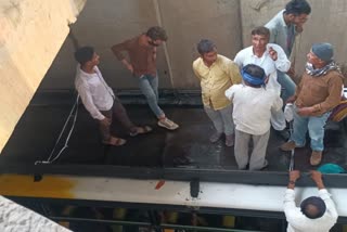 private bus stuck in Neemkathana underpass