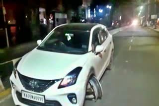 rash car drive in bengluru  rash car drive  bengaluru car accident  bengaluru accident  ಕುಡಿದ ಮತ್ತಿನಲ್ಲಿ ವೇಗದ ಕಾರು ಚಾಲನೆ  ಅತಿವೇಗವಾಗಿ ಕಾರು ಚಲಾಯಿಸಿದ ಘಟನೆ  ಕಾರಿನ ಟಯರ್ ಬ್ಲಾಸ್ಟ್ ನಡುವೆಯೂ ಬೇಕಾಬಿಟ್ಟಿ ಚಾಲನೆ  ವೇಗವಾಗಿ ಕಾರು ಚಾಲನೆ  ಅತೀ ವೇಗದ ಕಾರು ಚಾಲನೆ  ಈಟಿವಿ ಭಾರತ ಕನ್ನಡ  Etv Bharat Kannada