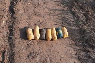 The seven packets containing heroin lying in a field in Taran Taran