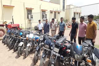 bikers doing stunts on the road