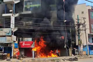 Automobiles oil shop on fire