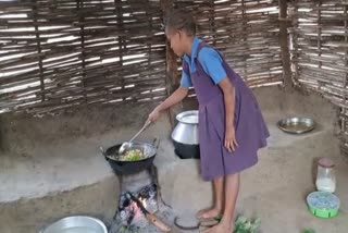 girls cooking mid day meal